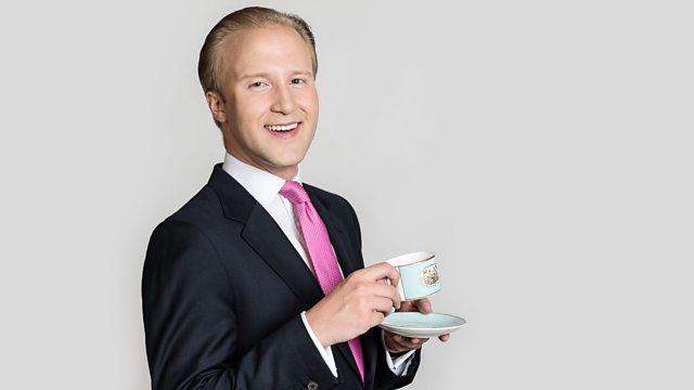 An image of William Hanson, Etiquette Expert, holding a cup and saucer and wearing a business suit and pink tie.
