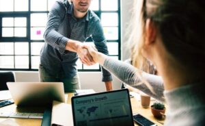 Interviewer and jobseeker shaking hands