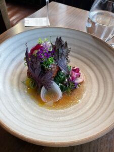A starter dish being served at Hide restaurant