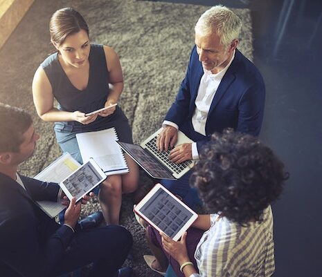 A group of people meeting in an office