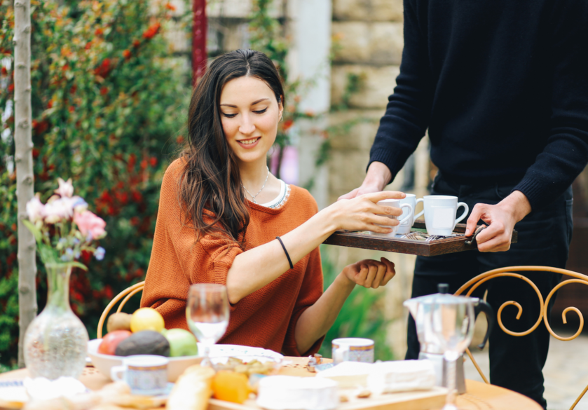 Woman being served b