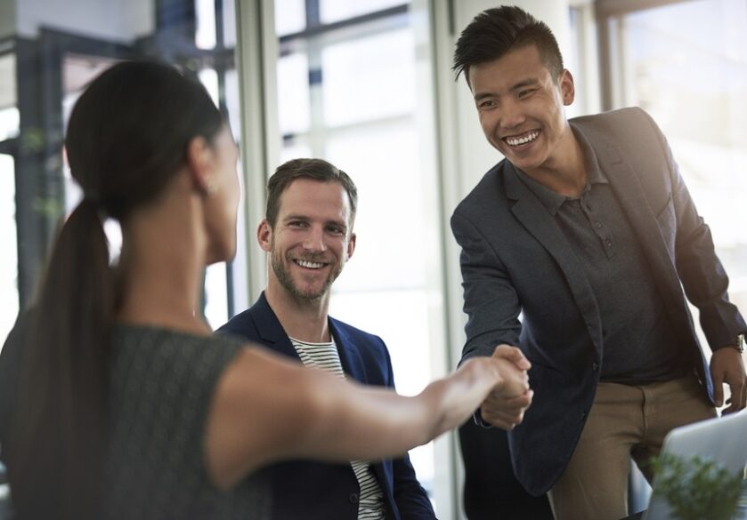 Colleagues greeting each other